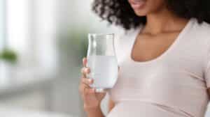 Pregnant Woman Drinking Sparkling Water